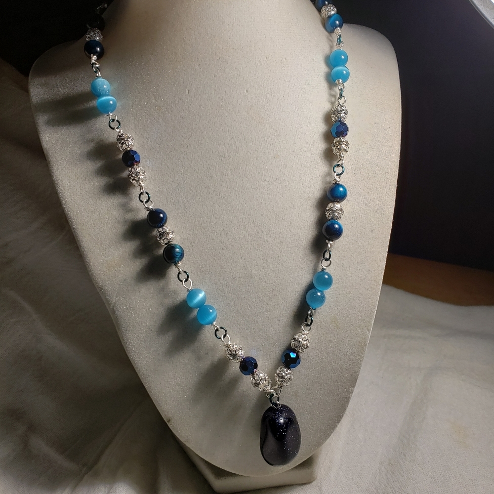 Handcrafted 20 In Blues With Sparkle Silver Spacers And A Dark Sparkly Pendant
